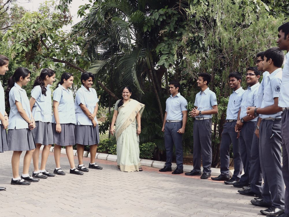 Students welcoming a new member of the CIRS community