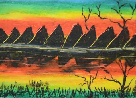 Dark peaks and bare trees reflected in water under an orange and pink sky