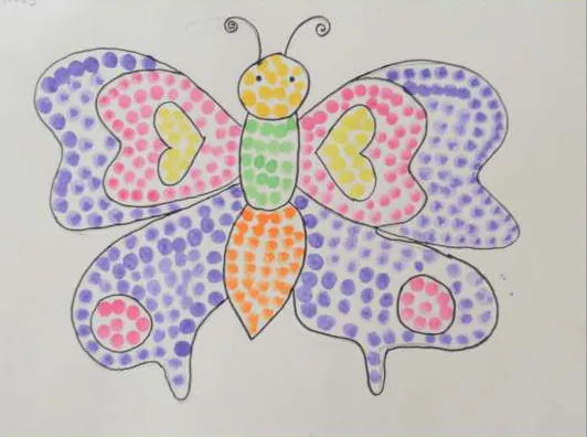 A butterfly filled with coloured dots