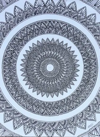 A round mandala in fine black pattern