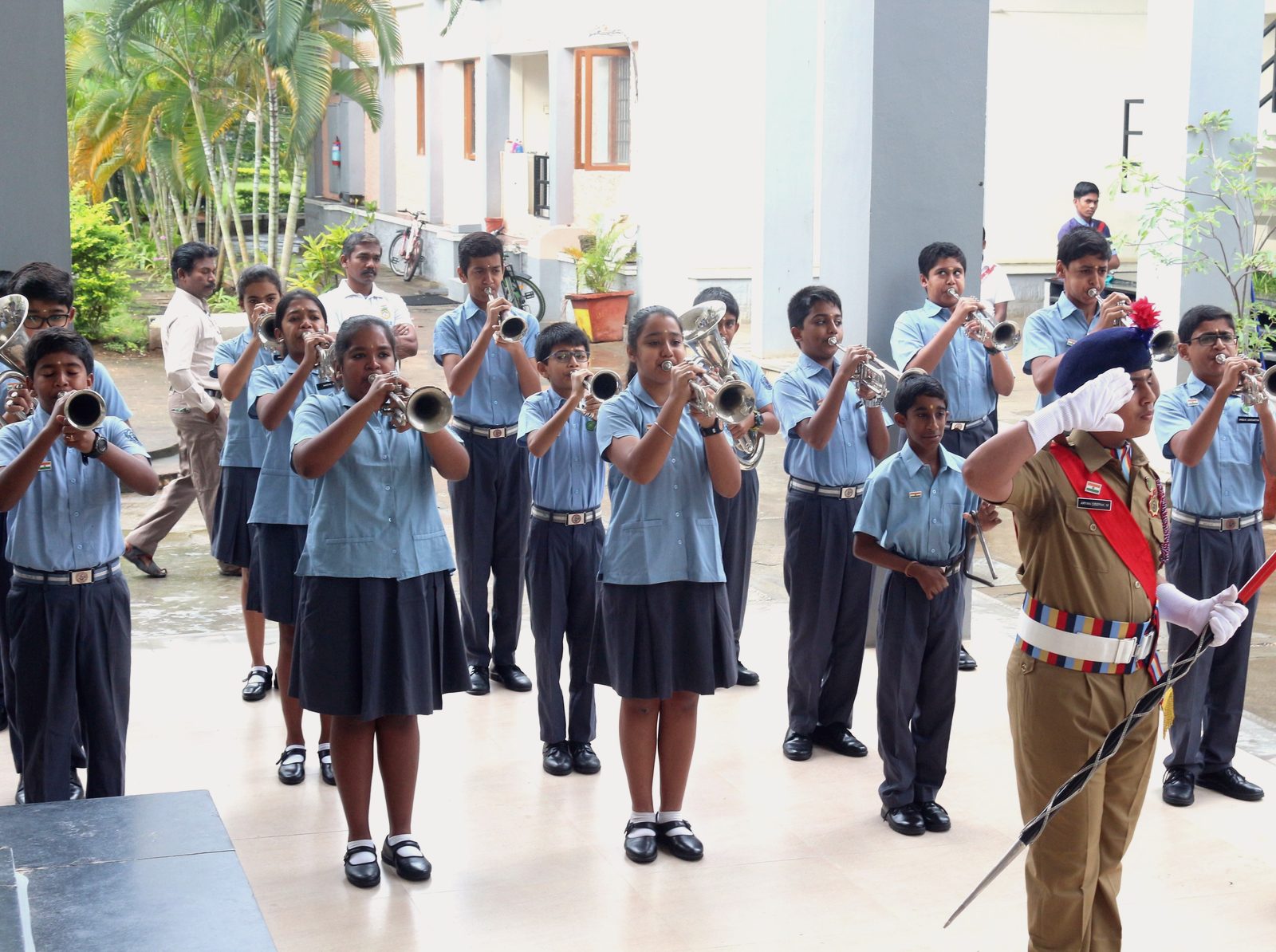 The CIRS student band performing outdoors in uniform