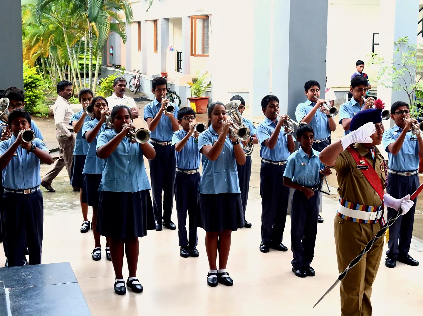 The CIRS student band performing outdoors in uniform
