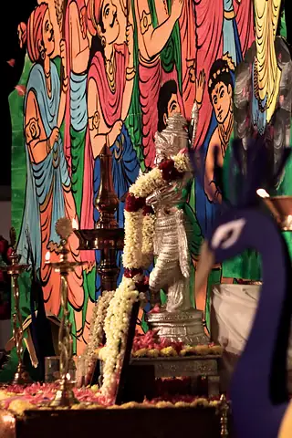 Flowers and artwork on a decorated stage