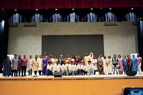 Teachers gathered on stage at the end of the Children's Day programme