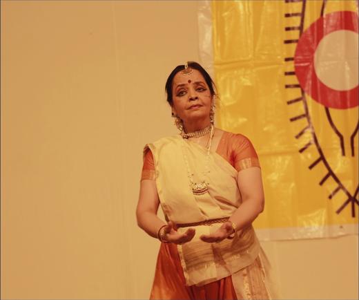 A visiting dancer, alone on stage