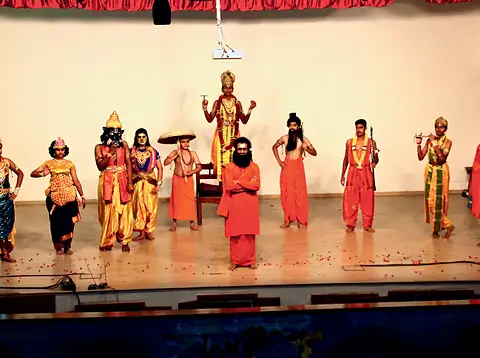 In costume, a tableau