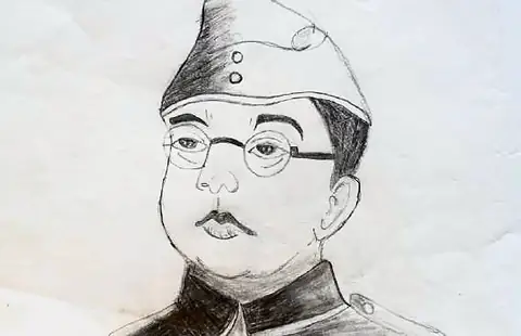 Portrait of Netaji Subhas Chandra Bose in his cap and glasses
The Crossroads, Issue 25 · July 2025
