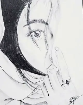 A girl with long dark hair, a finger to her lips, in grey
The Crossroads, Issue 26 · Anand Utsav issue
