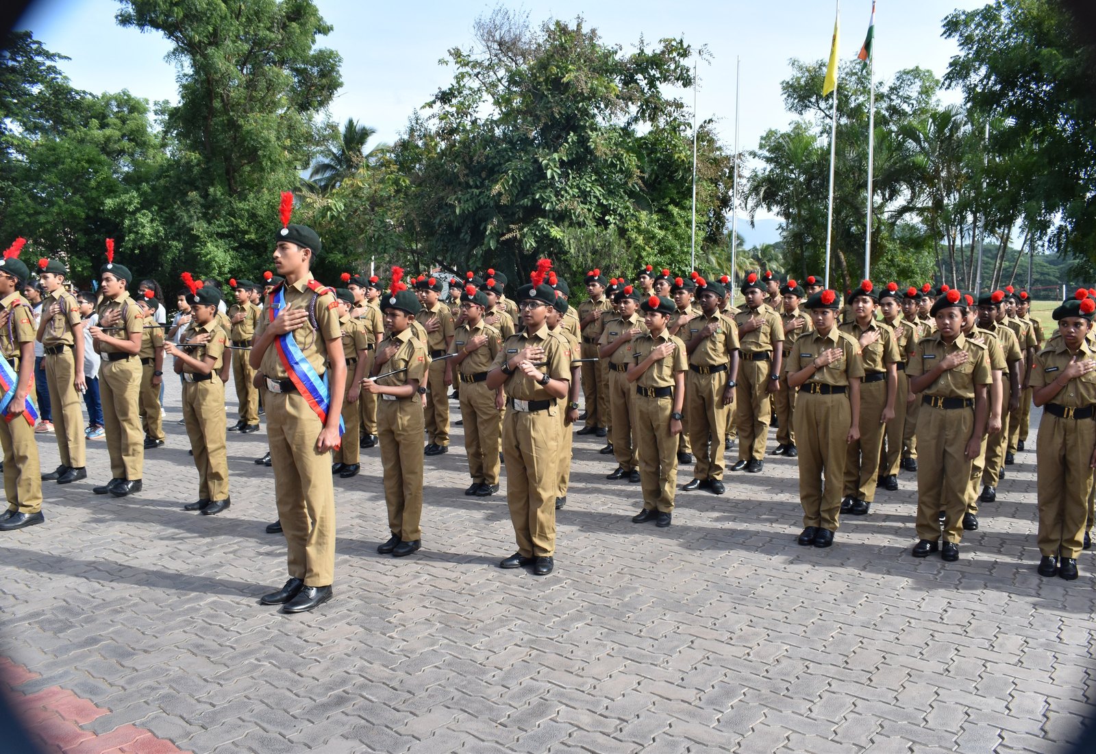 CIRS cadets standing in formation on the campus grounds