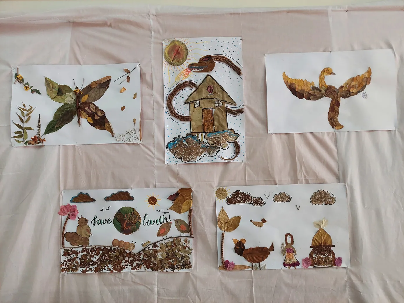 Finished artworks made from dry leaves at the Dry Leaves Composition Competition