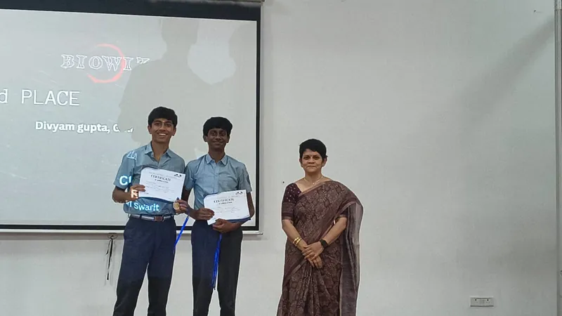 Two CIRS students with their certificates at T'XOTICA & GENOMIA