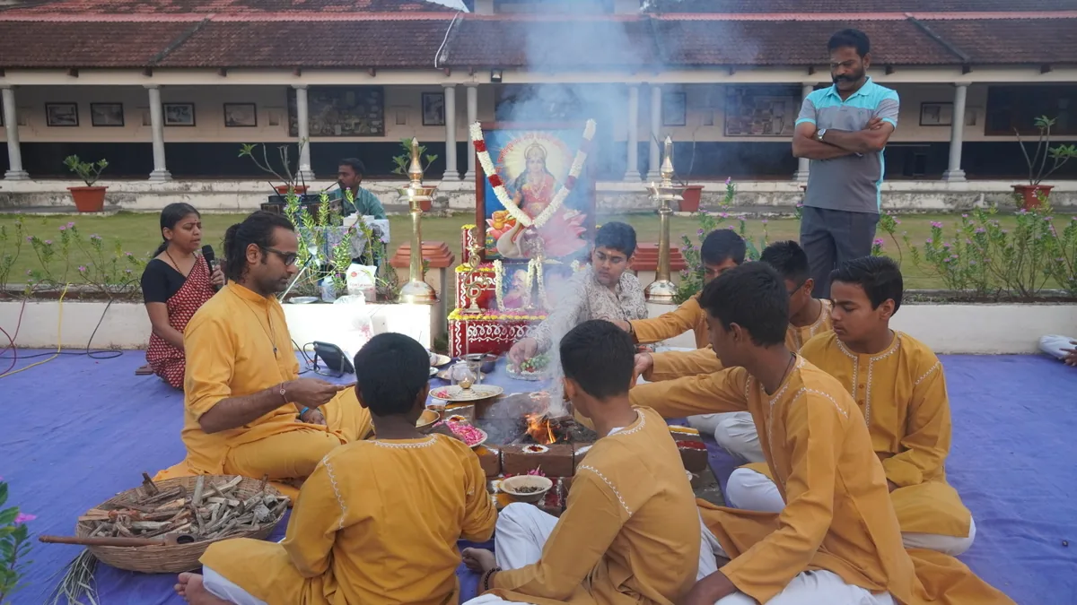 CIRS students gathered around the ceremonial fire for Gayathri Havan