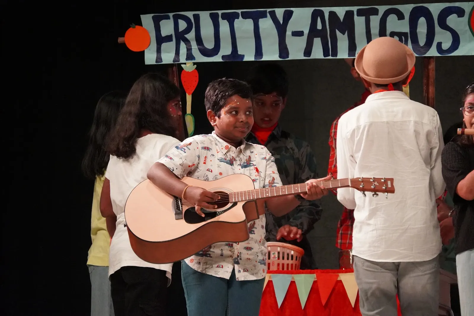 Vishwamitra performers at a guitar stall on the El Diablo stage